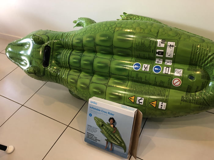 Inflatable pool toy covered with with warnings compared to the box it comes in 9GAG