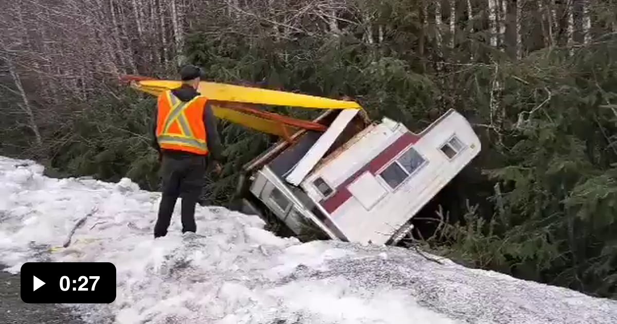 Camper being pulled out of a ditch 9GAG