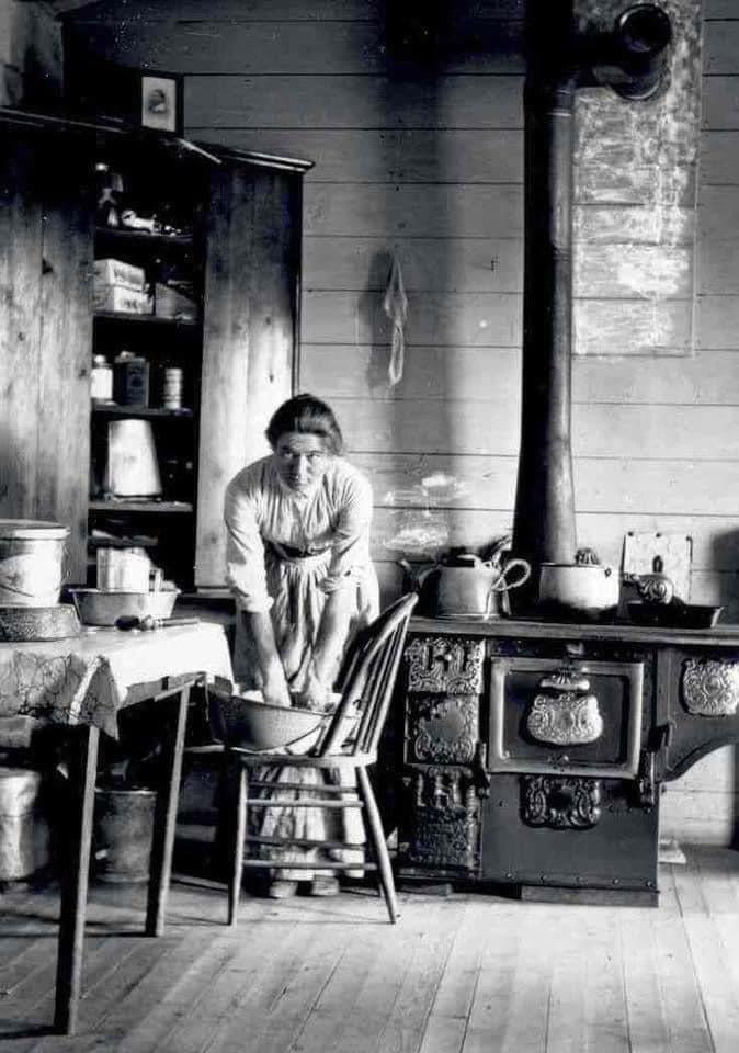 Woman in the kitchen of a Montana farmhouse, ca.1900. - 9GAG