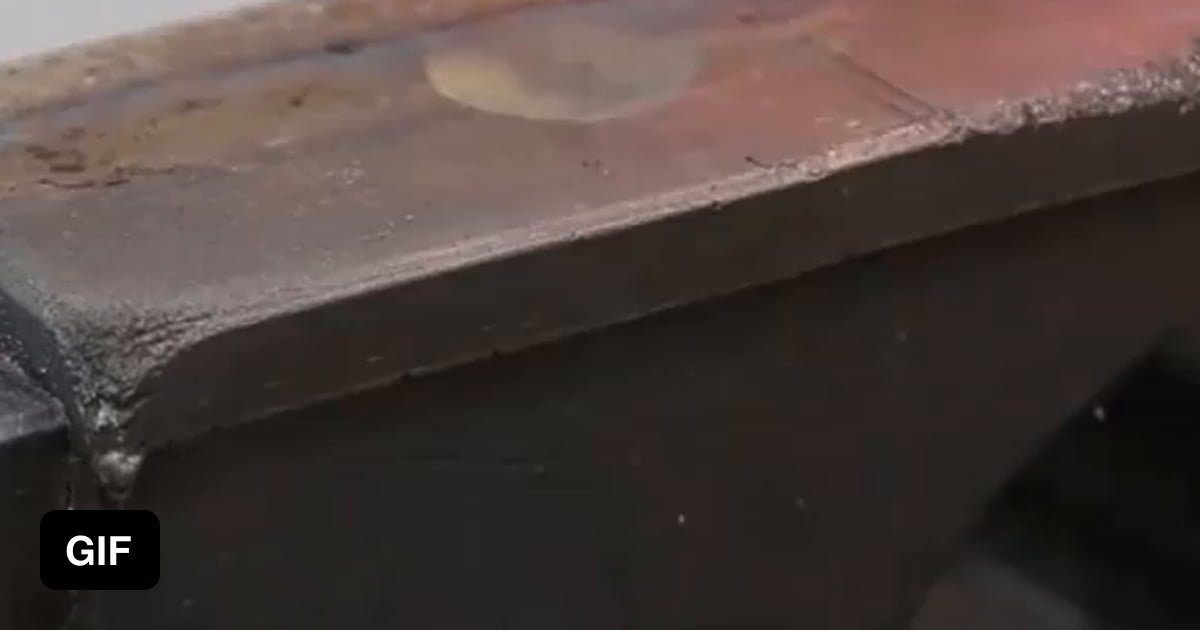 1200 C ball of tungsten burning through lead. 9GAG