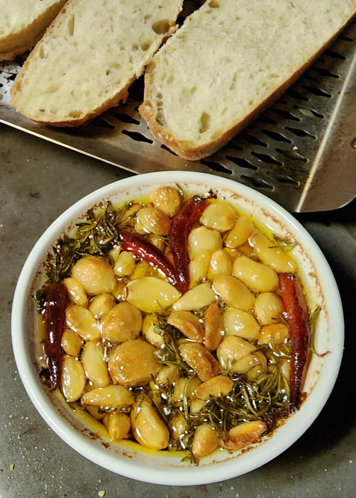 Garlic Confit with Thyme, Rosemary, and Thai Chili 9GAG