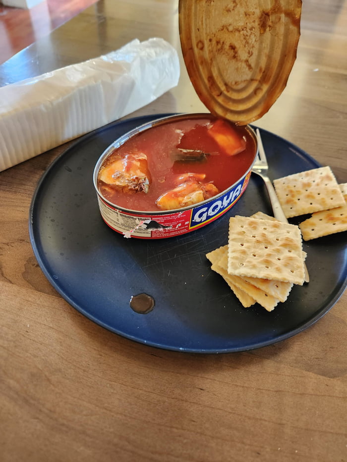 Once a struggle meal, now a comfort food. Canned sardines in spicy