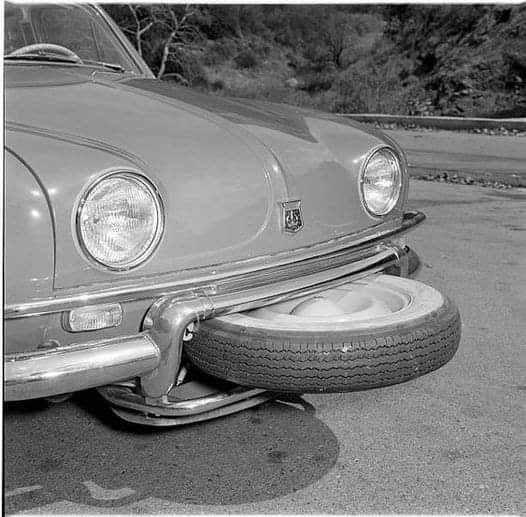 A Renault Dauphine with the spare wheel out! 9GAG