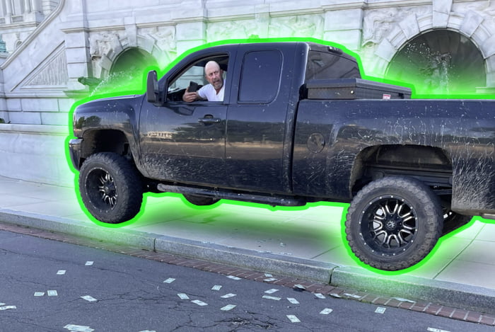 a-man-in-a-pickup-truck-in-front-of-the-library-of-congress-claims-to