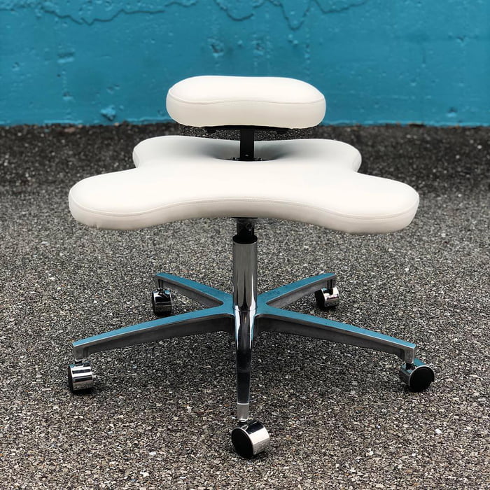 This Chair Is Designed To Let You Sit Cross Legged At The Office