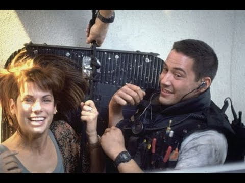 Keanu Reeves Under Bus Keanu and sandra goofing around under the bus on the set for speed 1994 ...