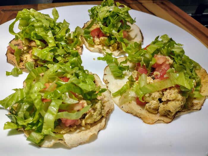 Jicama Breakfast Tacos Scrambled Brown Butter Eggs, Tomatoes, and Shredded Lettuce on Jicama