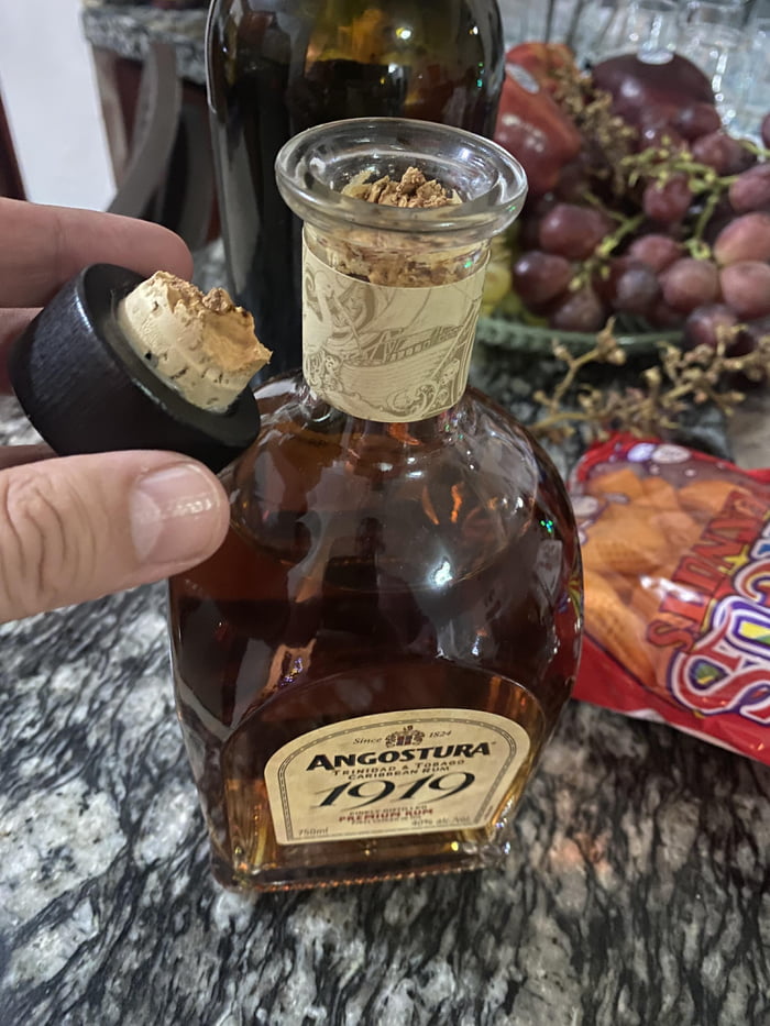 Old rum bottle with cork 9GAG