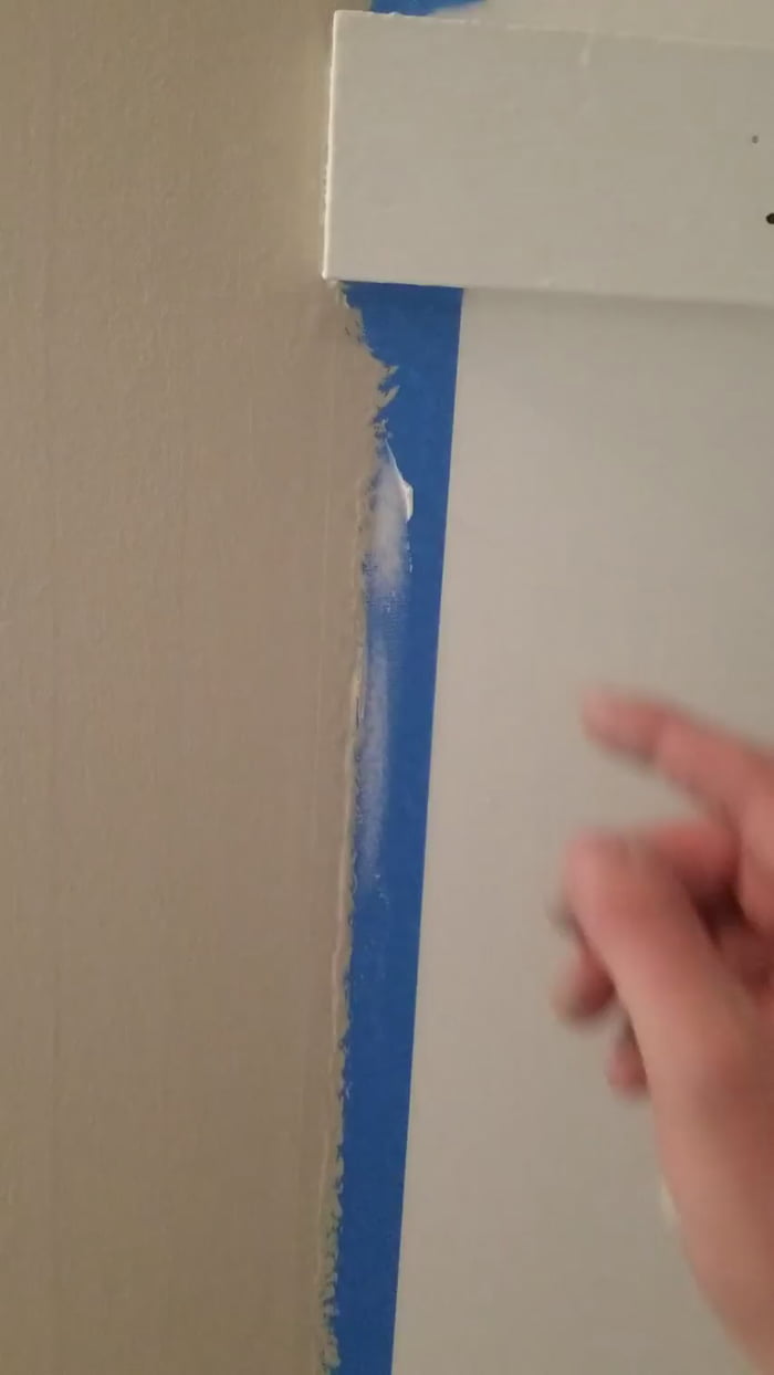 Peeling the tape off after painting 9GAG