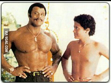 Just a young Dwayne Johnson with his daddy..damn genetics ...