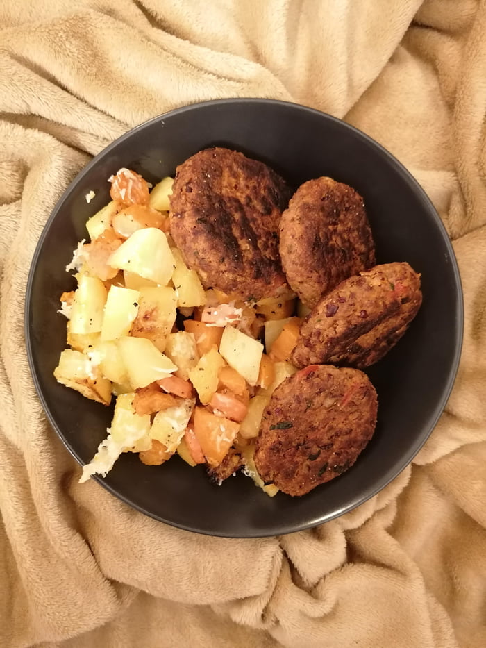 Oats & Beans Burger Patties served with roasted vegetables & topped