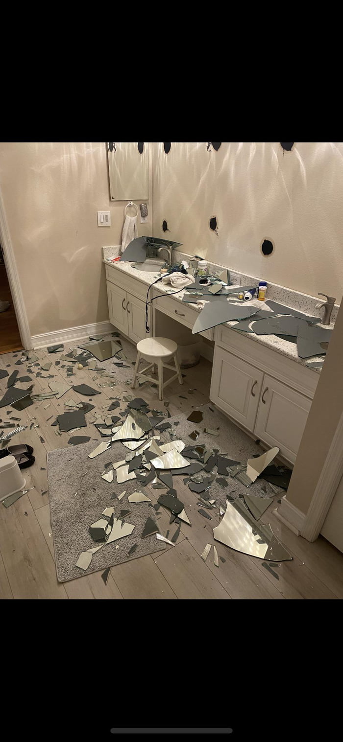 Builder mirror fell off the wall in the middle of the night. 9GAG