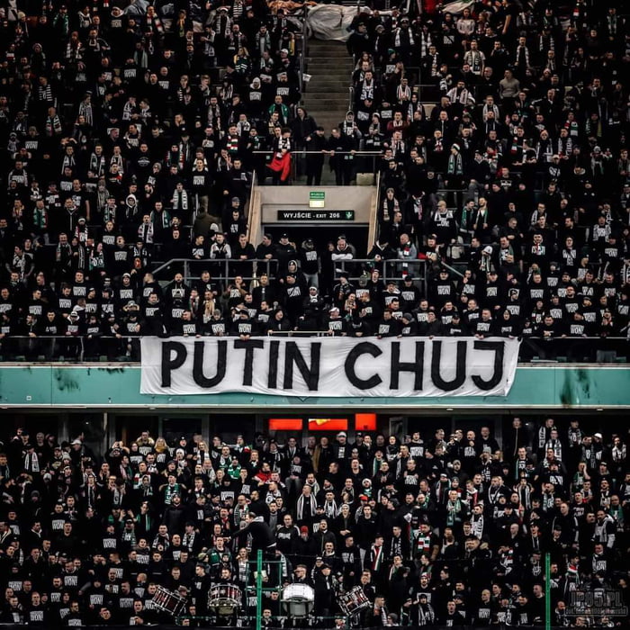 Polish football fans with banner against Putin. Jebać Putina, wolna