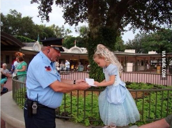 the-security-guard-at-disneyland-asks-a-little-girl-for-an-autograph