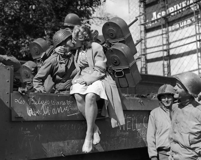 A French girl kisses an American soldier, following the liberation of ...