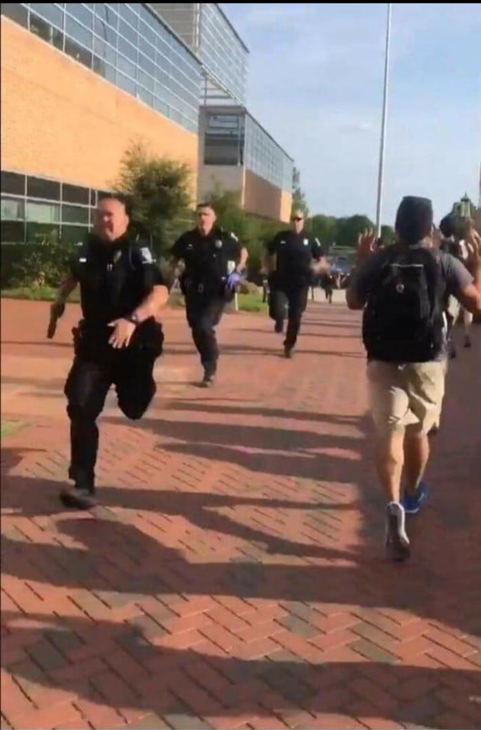 The cops that ran in the building during an active shooter at a school ...