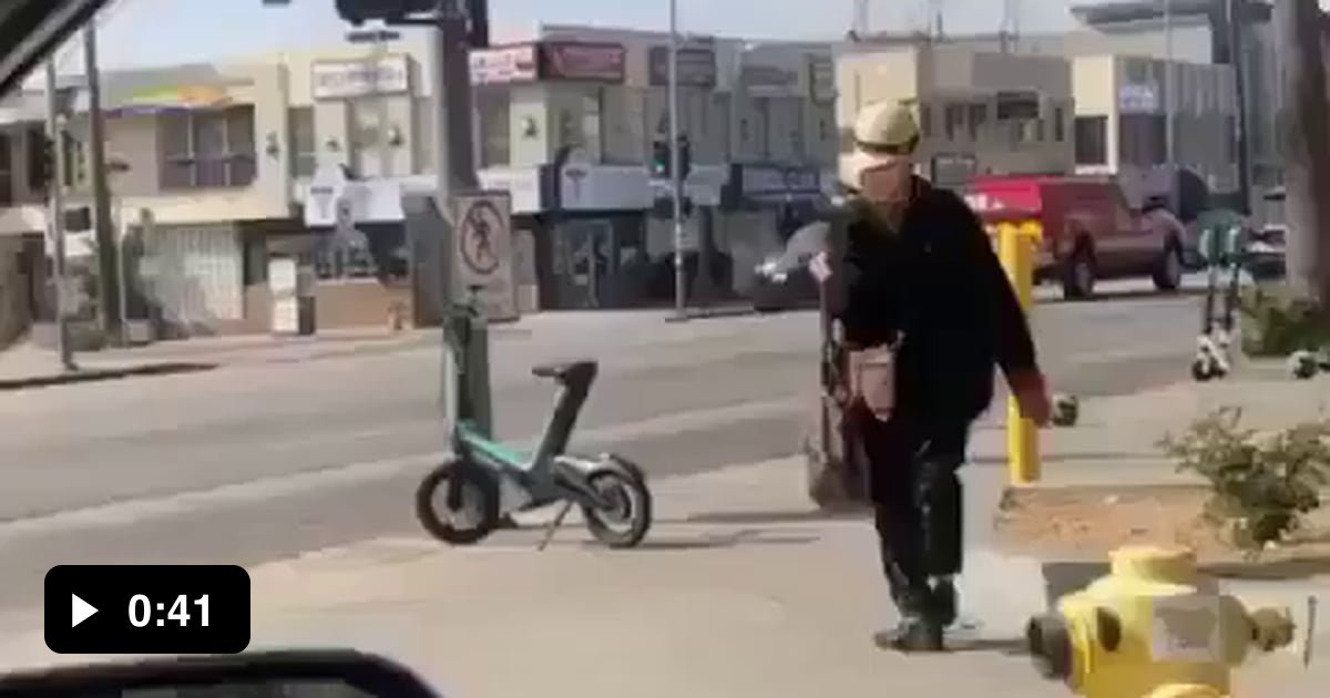 Lady pushes scooters on to the street for insane reasons 9GAG