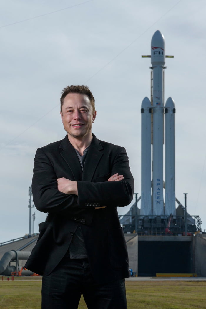 elon-musk-standing-next-to-the-falcon-heavy-the-most-powerful-rocket