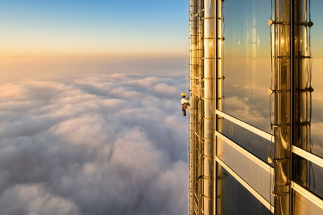 A Window Cleaner Stops At The 124th Floor Of The Burj