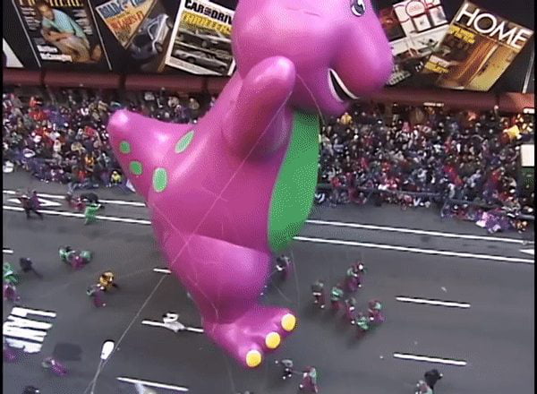 Never Forget. 1997 Macy's Thanksgiving Parade. RIP Barney Balloon - 9GAG