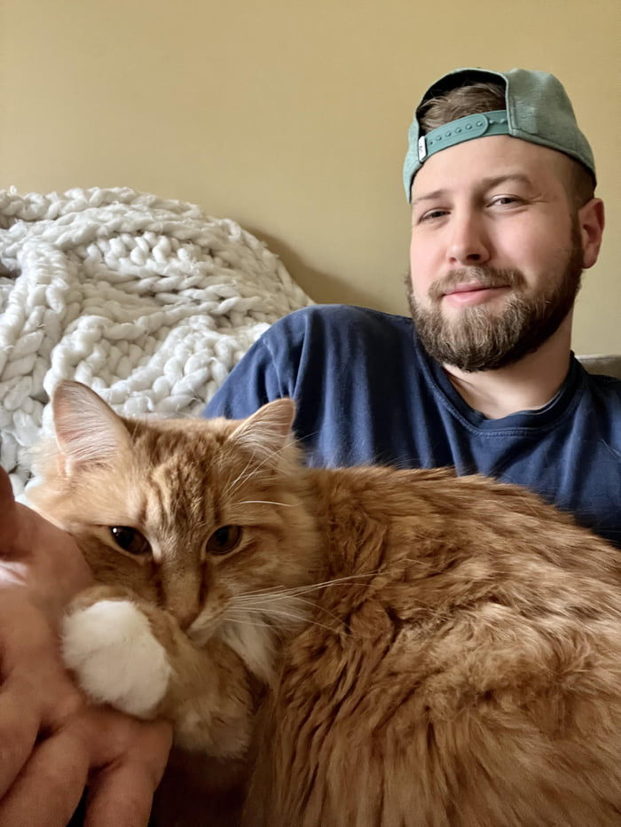 This clingy little cat always has to be touching me with his paw 9GAG