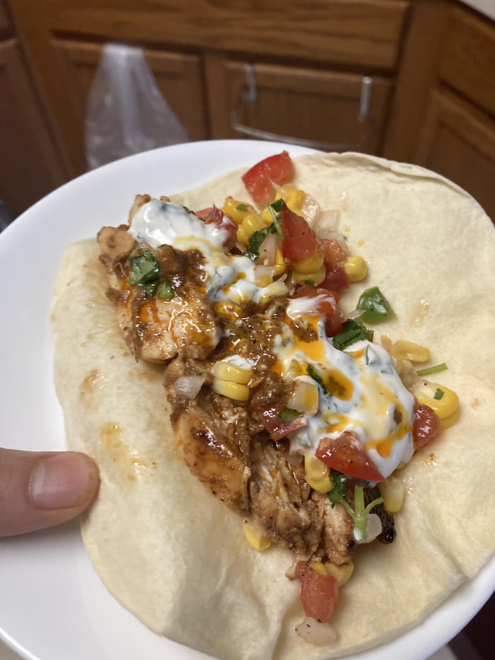 Marinated chicken fajitas with roasted corn pico and cilantro, jalapeno