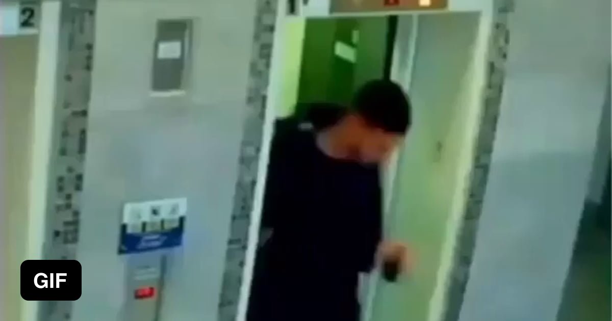 CCTV shows man saving a dog that had his leash caught in the elevator