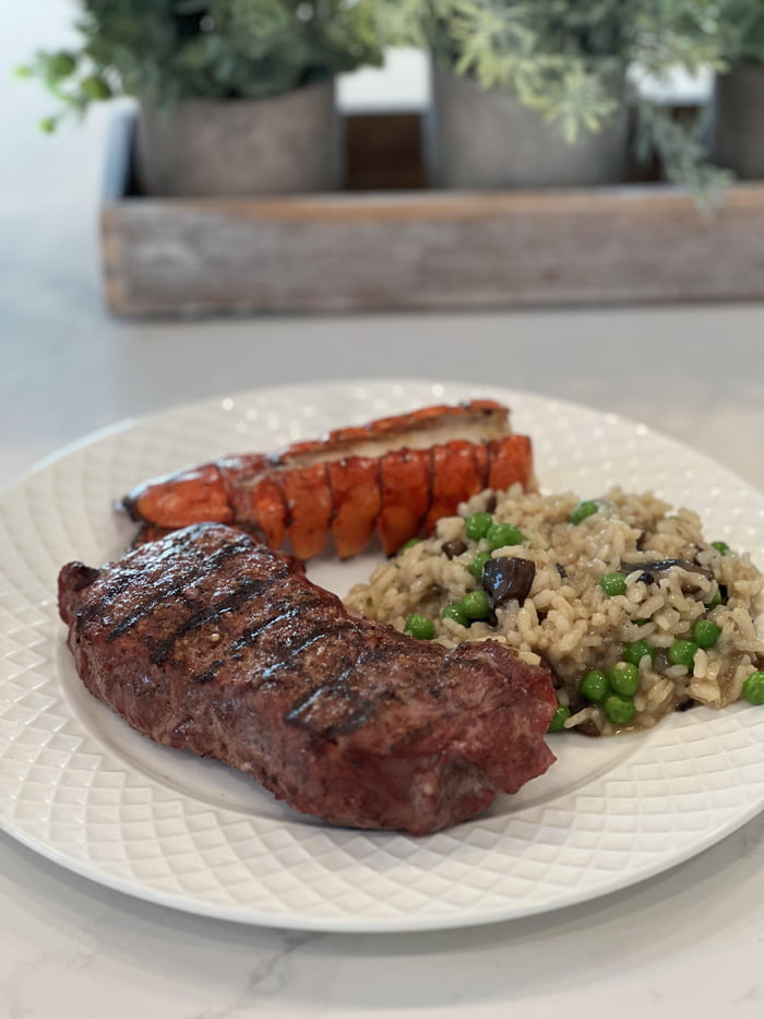 Ny Strip Lobster Tail And Mushroom And Pea Risotto Gag