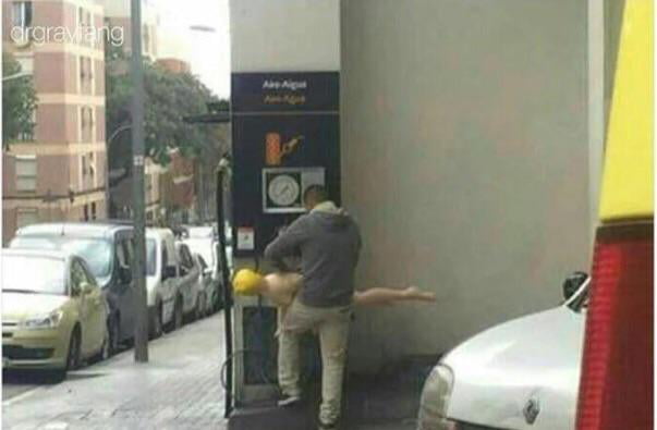 A man blowing up his sex doll at a gas station. - 9GAG