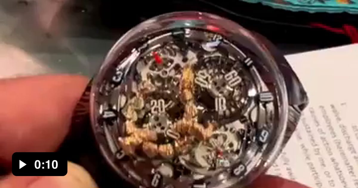 Amazing moving dragon in the mechanical watch that indicates the tens ...