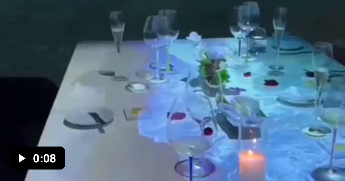 Creative interactive dinning table sets the mood at this fancy