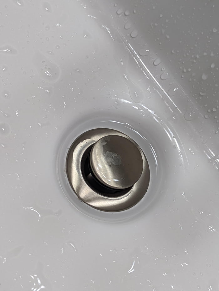 The Water Flows Down But The Raised Rim Of The Drain Means There s 