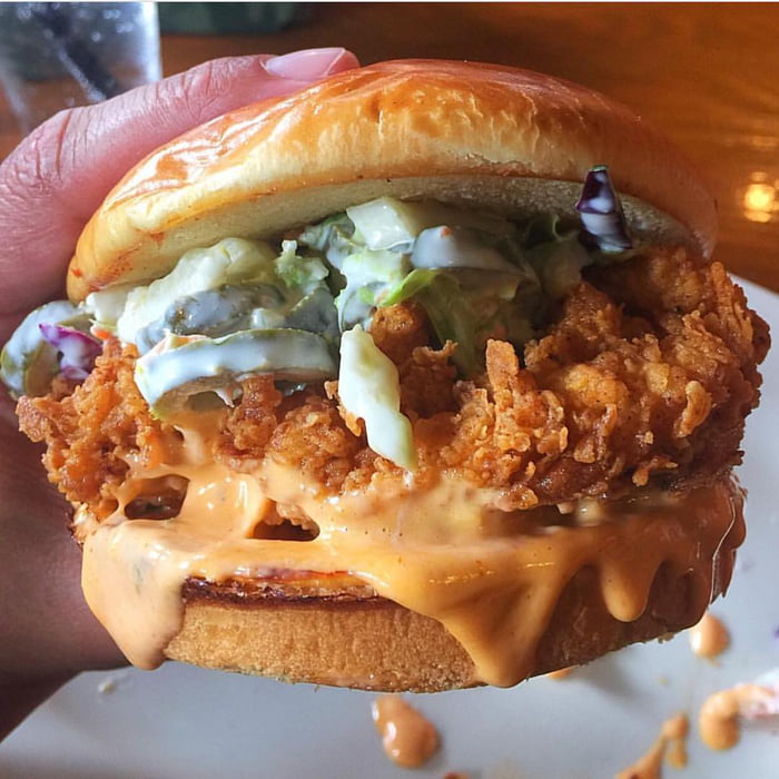 Buttermilk fried chicken sandwich with jalapeno coleslaw on a brioche ...