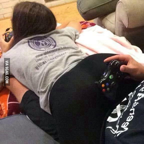 Girlfriend and video game in perfect harmony...