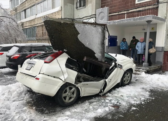A Concrete Slab Fell From The Roof Of A Nine Story Building Onto A Car In Vladivostok Russia Its Owner Who Was Cleaning The Hood Of Snow Managed To Escape He Bought The