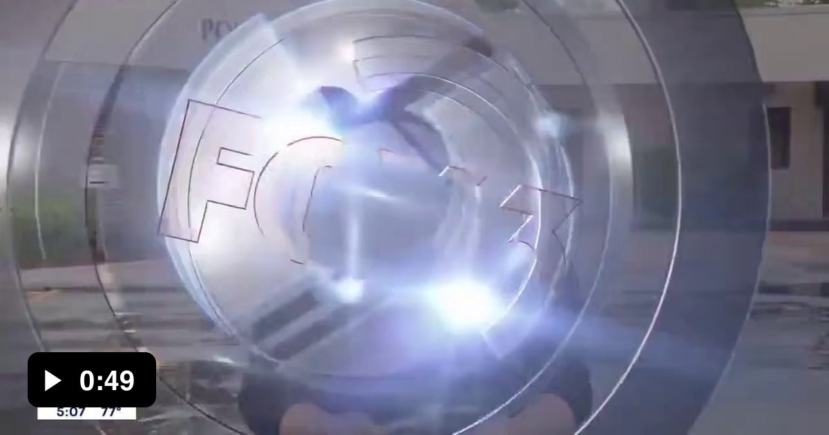 Man points gun at reporter whilst she is doing a report on gun violence