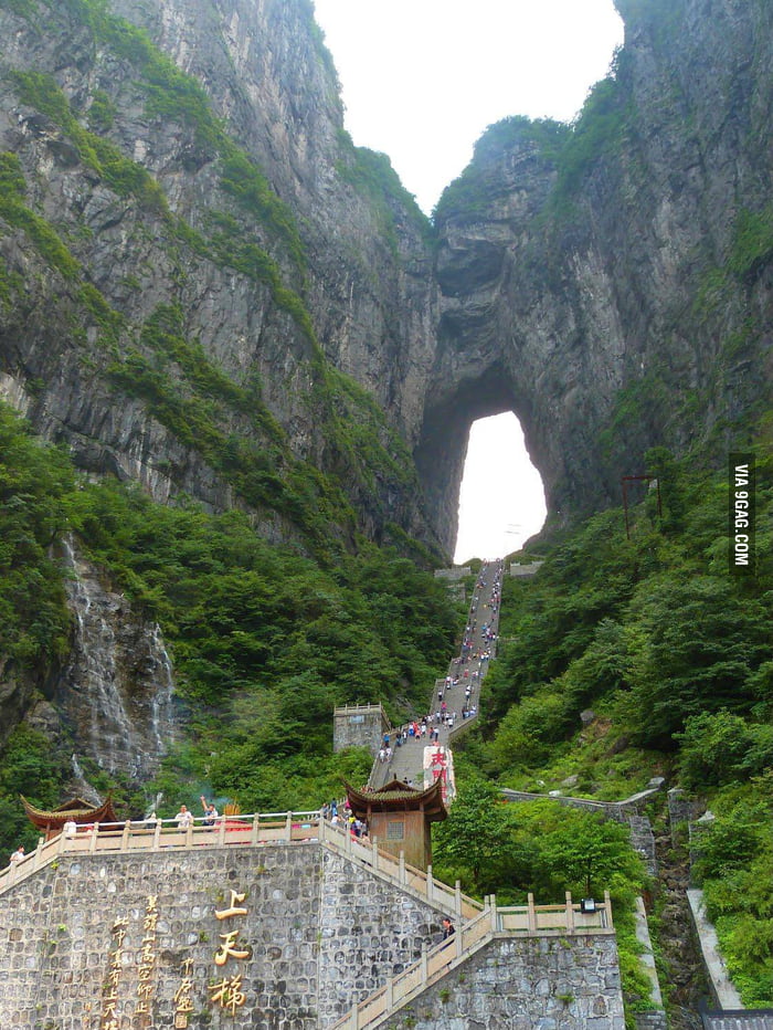 Natural hole in a 131.5 metre mountain in China - 9GAG