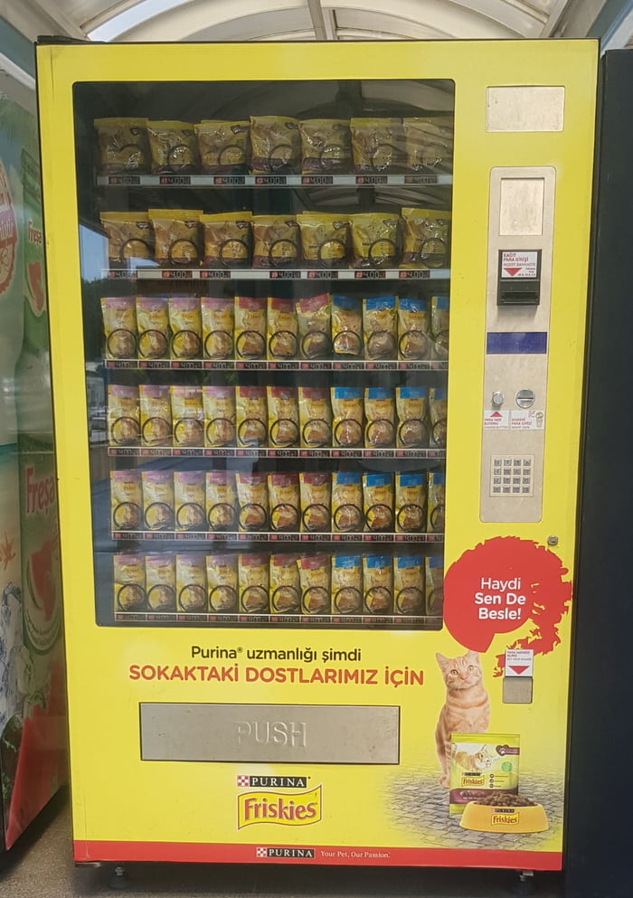 I just came across to vending machine for feeding stray animals. Guess
