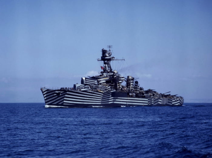 The French light cruiser Gloire in dazzle camouflage off the coast of ...