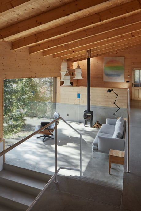 Small Multi Level Living Space Of Wood And Concrete Built On The