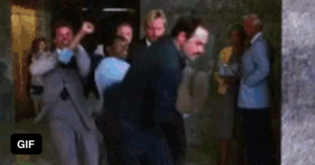 Kanye West being kindly escorted out of Little Caesars. 9GAG