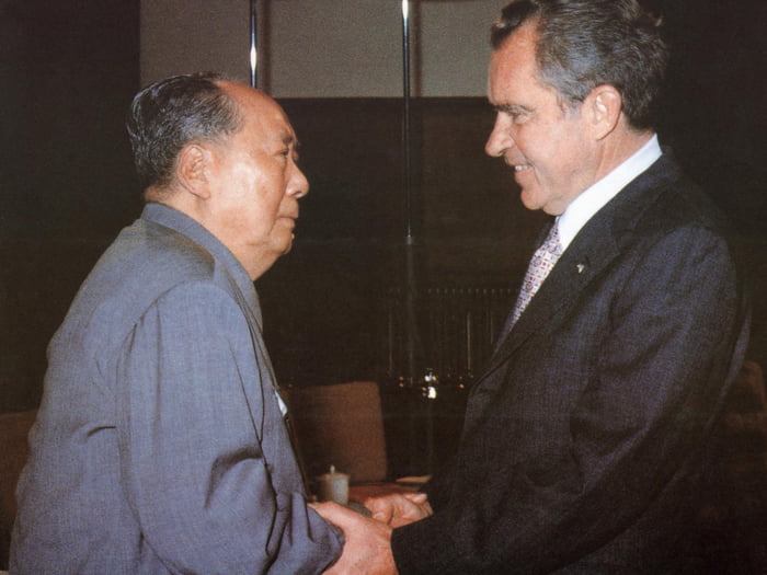 Chairman Mao Zedong greets former President Richard Nixon at his ...