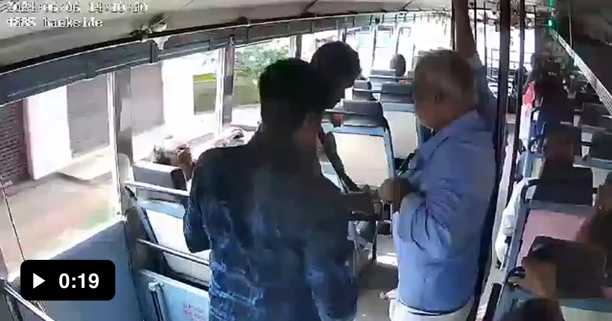Bus conductor easily saves man from falling down a moving bus - 9GAG