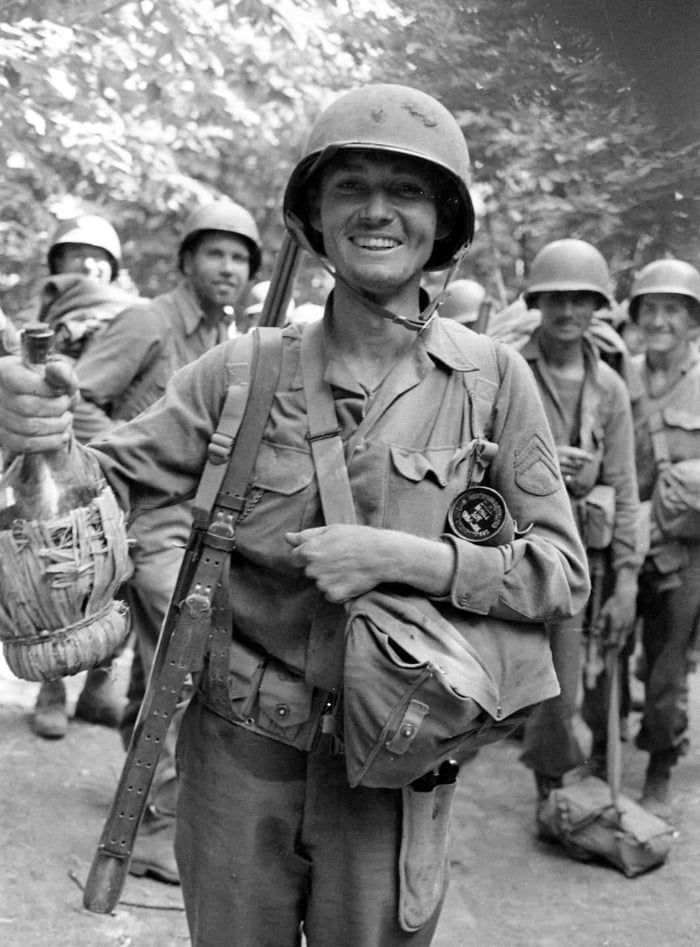 Smiling US Army 36th ID Staff Sergeant with a bottle of Vino near Cori ...