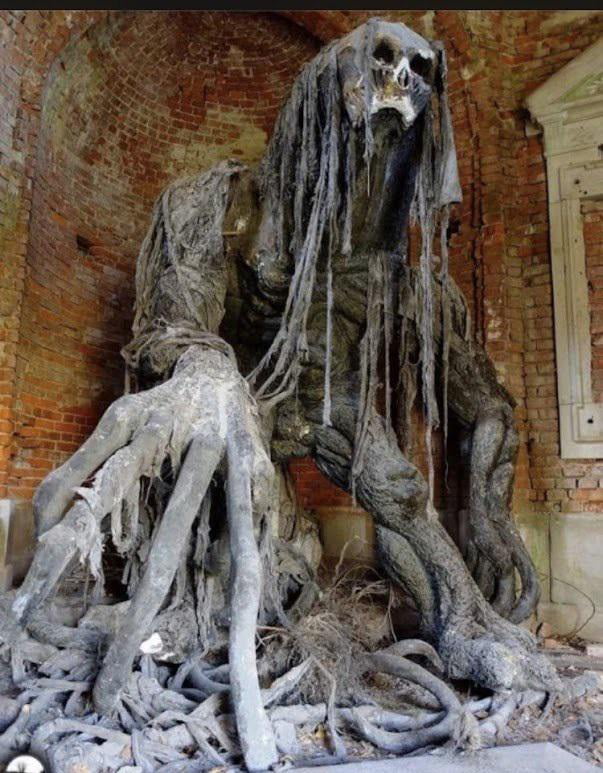 Demon sculpture in an abandoned mausoleum in Poland. - 9GAG