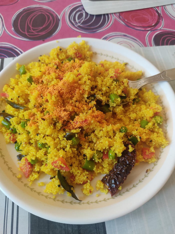 Wheat grain upma with seasonal vegetables, seasoned with some podi