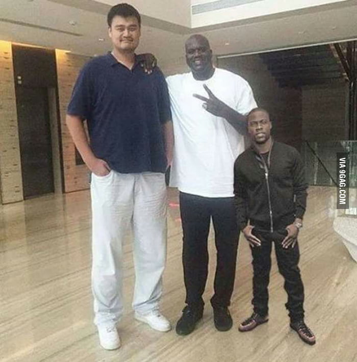 Shaq holding The Rock and getting held by Yao Ming ...