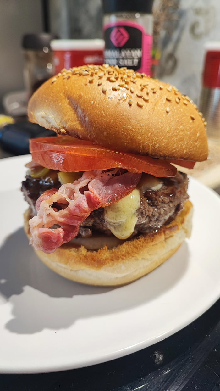 Homemade bacon, apple wood cheese burger with demiglace white truffle