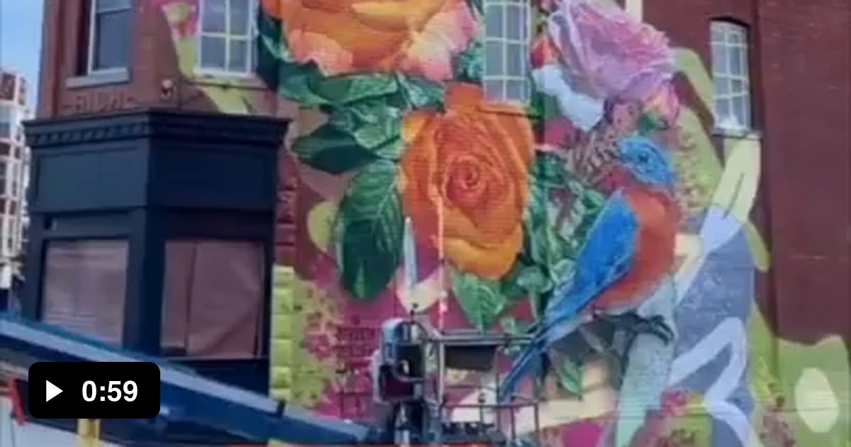 Timelapse of painting a mural on a building 9GAG
