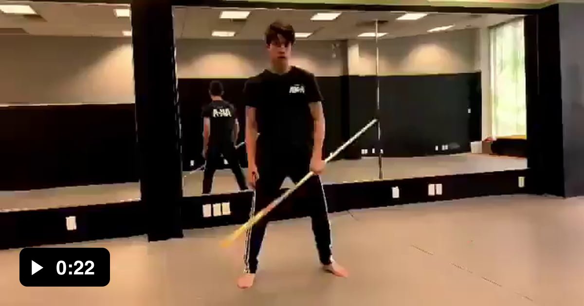 Guy showing off some impressive bo staff skills. 9GAG